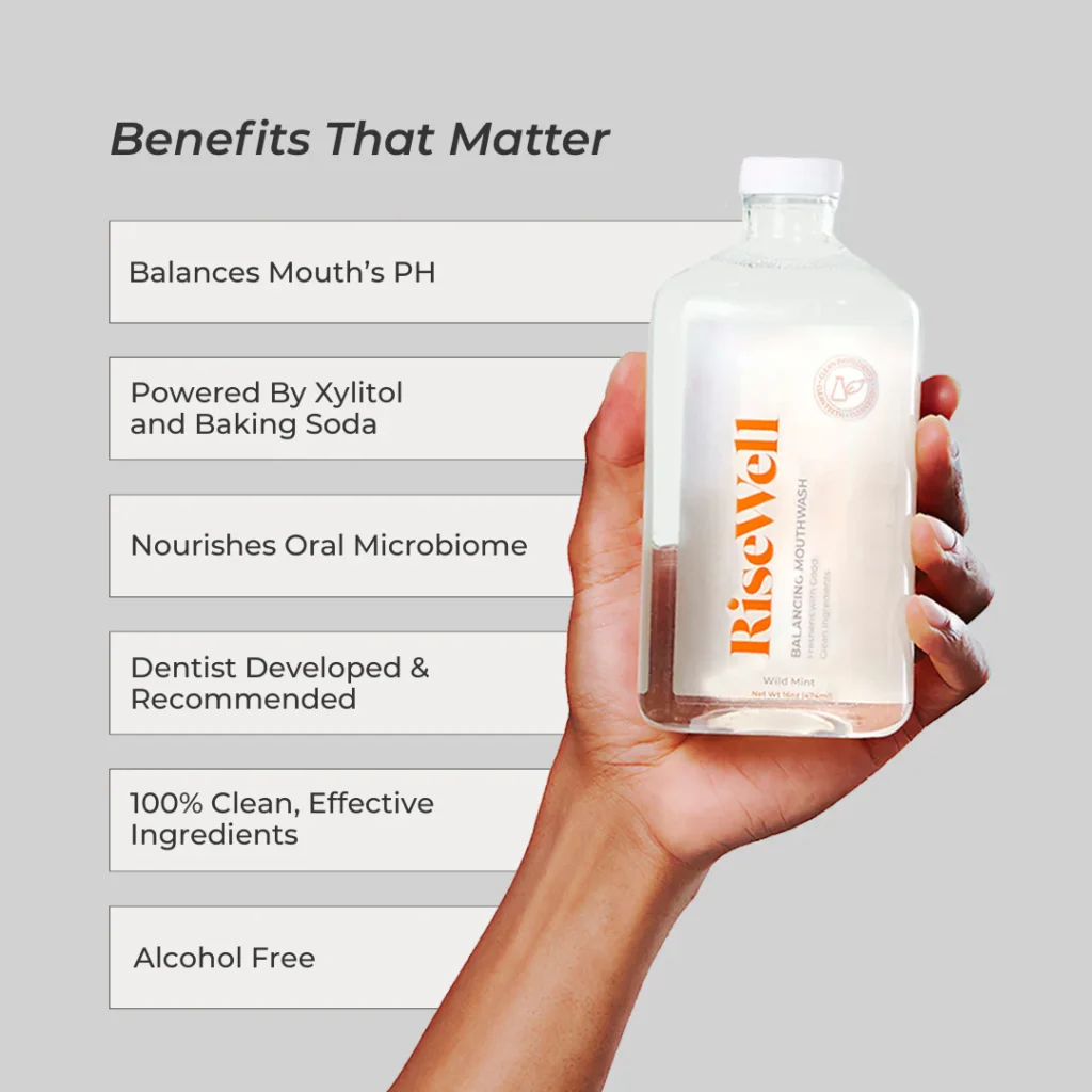 A bottle of RiseWell Alkalizing Mouthwash in hand, highlighting its natural ingredients and benefits.