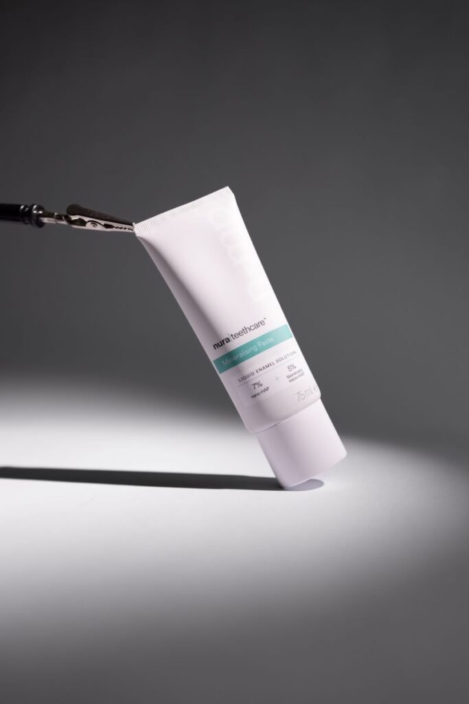 nura toothpaste tube in the spotlight