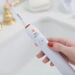 brio-ollie-smartclean-white-toothbrush-on-bathroom-counter