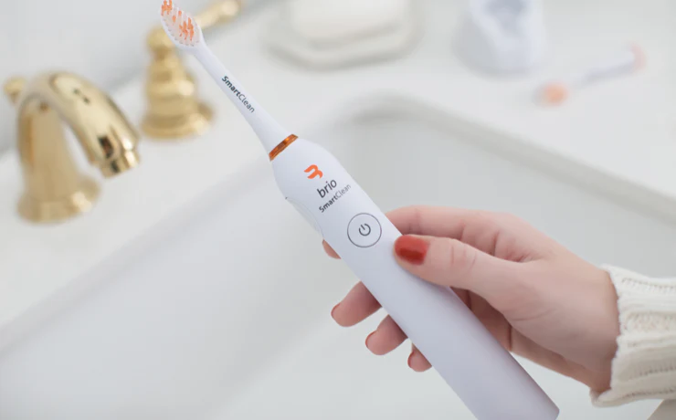 brio-ollie-smartclean-white-toothbrush-on-bathroom-counter