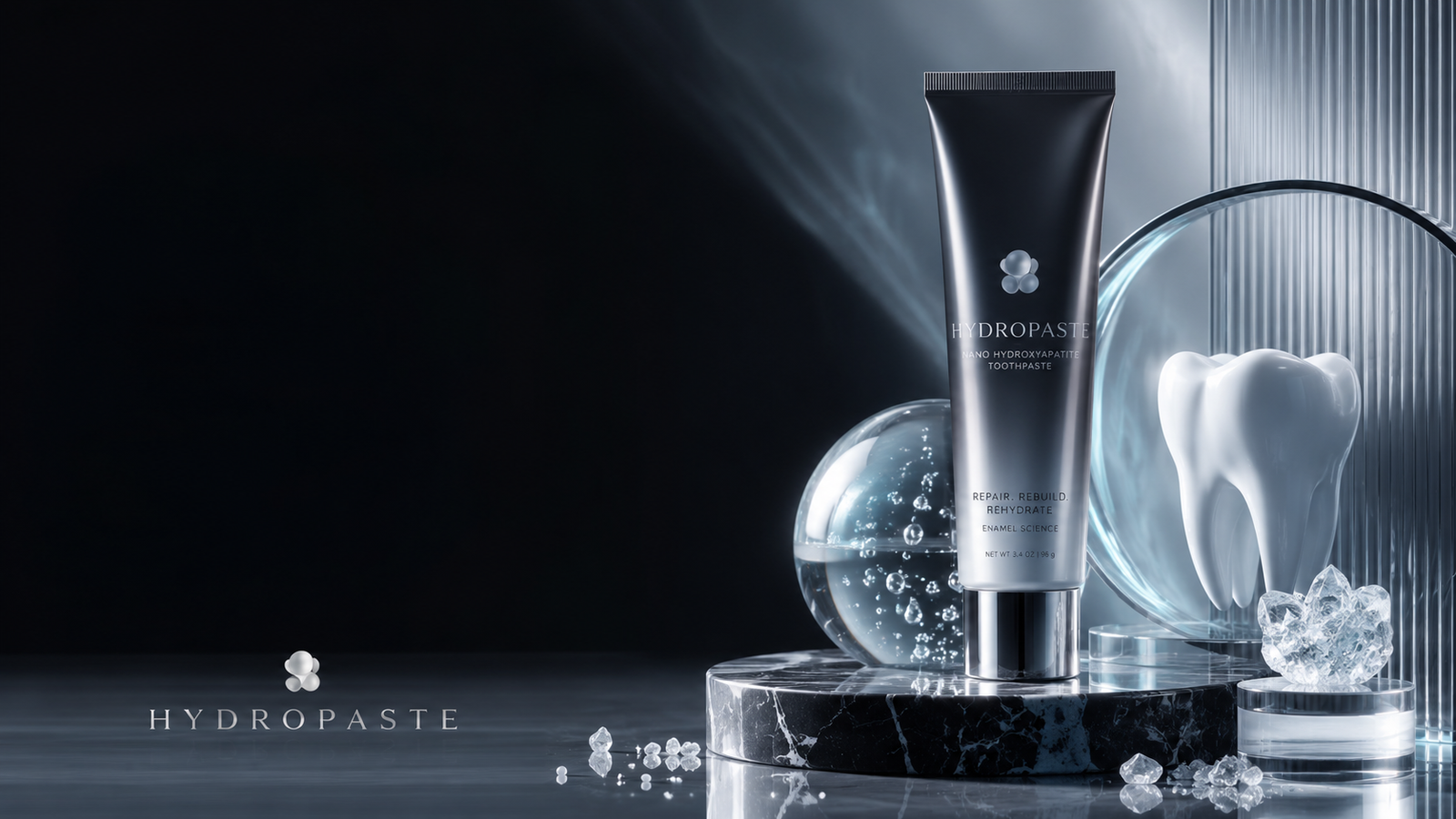 Luxury Hydropaste hero image showing premium nano-hydroxyapatite toothpaste, enamel minerals, a sculptural tooth, and scientific oral care branding.