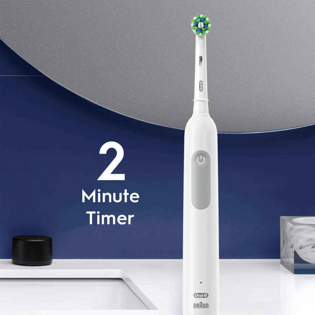 Oral-B White Pro 1000 electric toothbrush highlighting its built-in 2-minute timer, rechargeable design, and replaceable brush head for effective daily brushing.