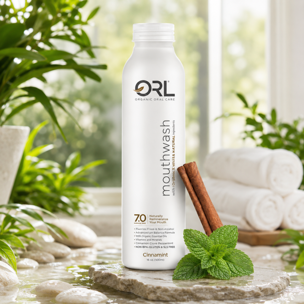 ORL mouthwash bottle with fresh mint and cinnamon in a bright, refreshing spa-inspired environment.