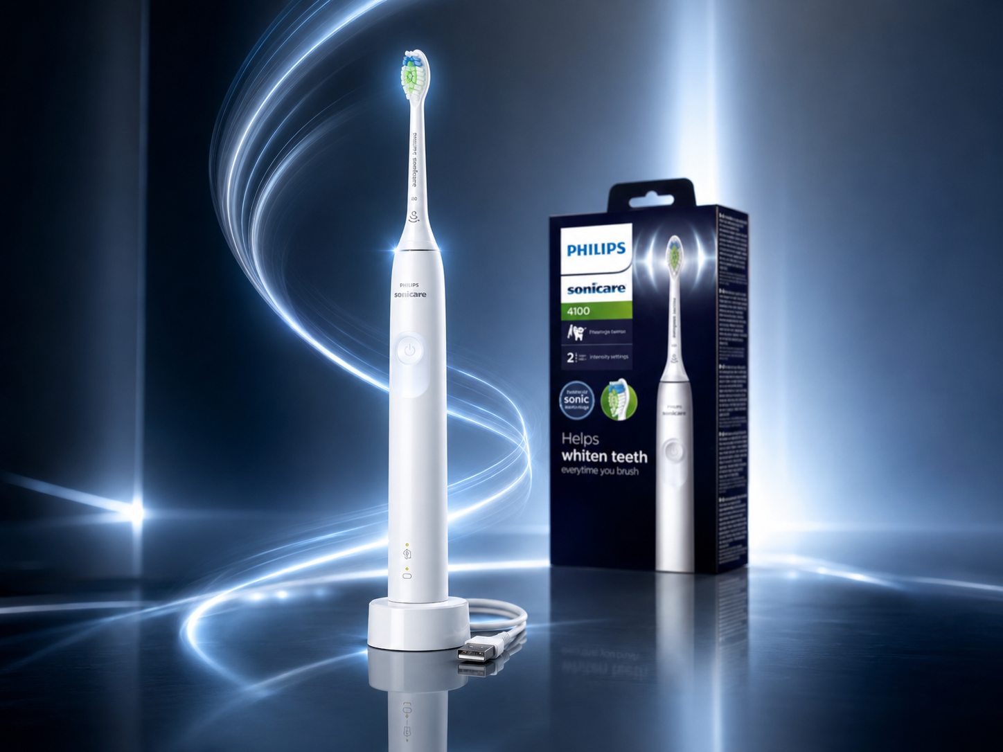 Philips Sonicare 4100 review image featuring the white electric toothbrush, charging base, USB cable, and retail packaging in a luxury blue studio setting.
